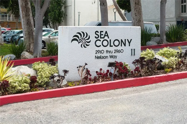 a street sign on the side of building