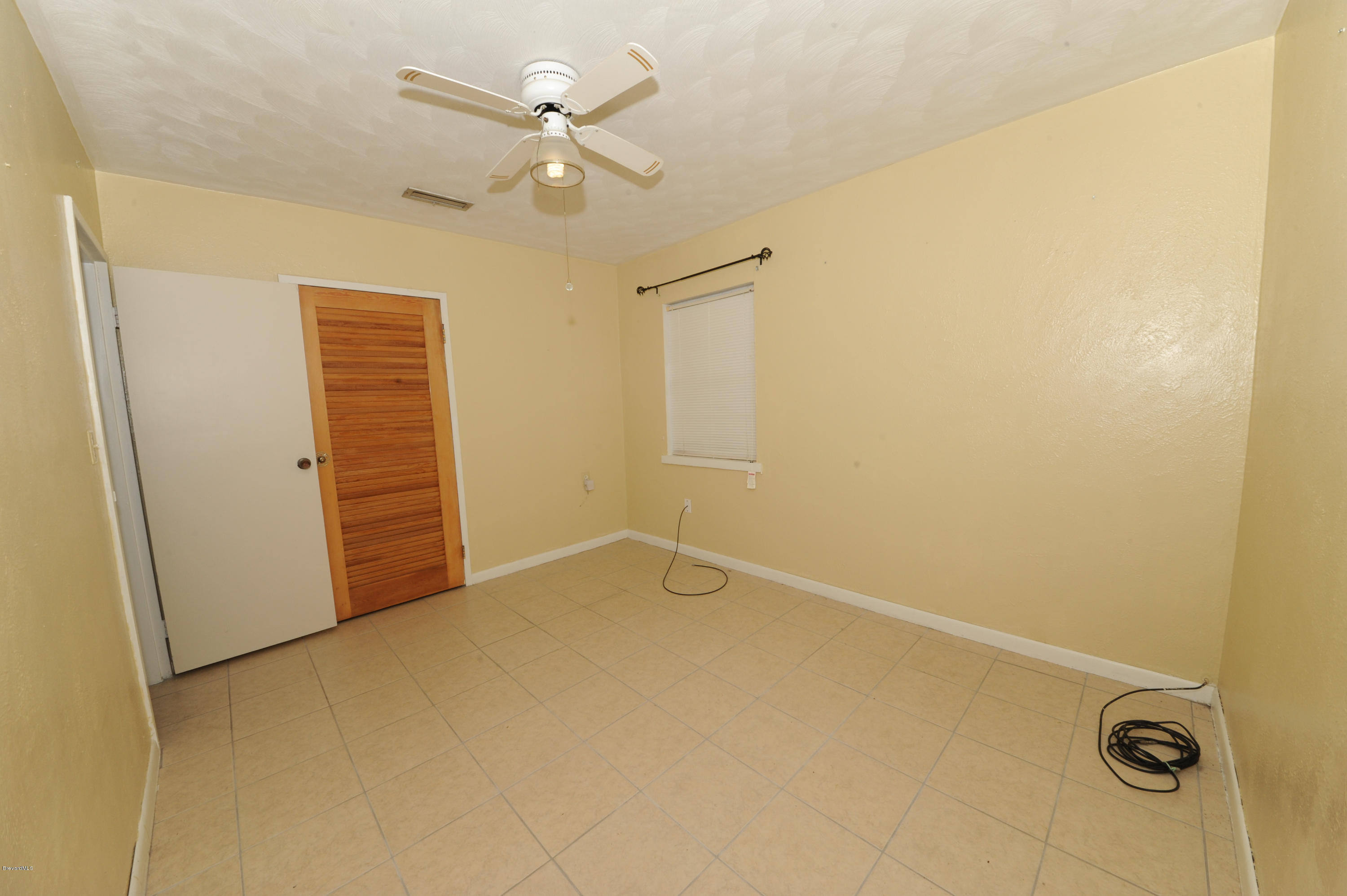 1014 Woodlawn Road Rockledge, FL 32955 - Photo 22 of 42 Bedroom 2 - View 2