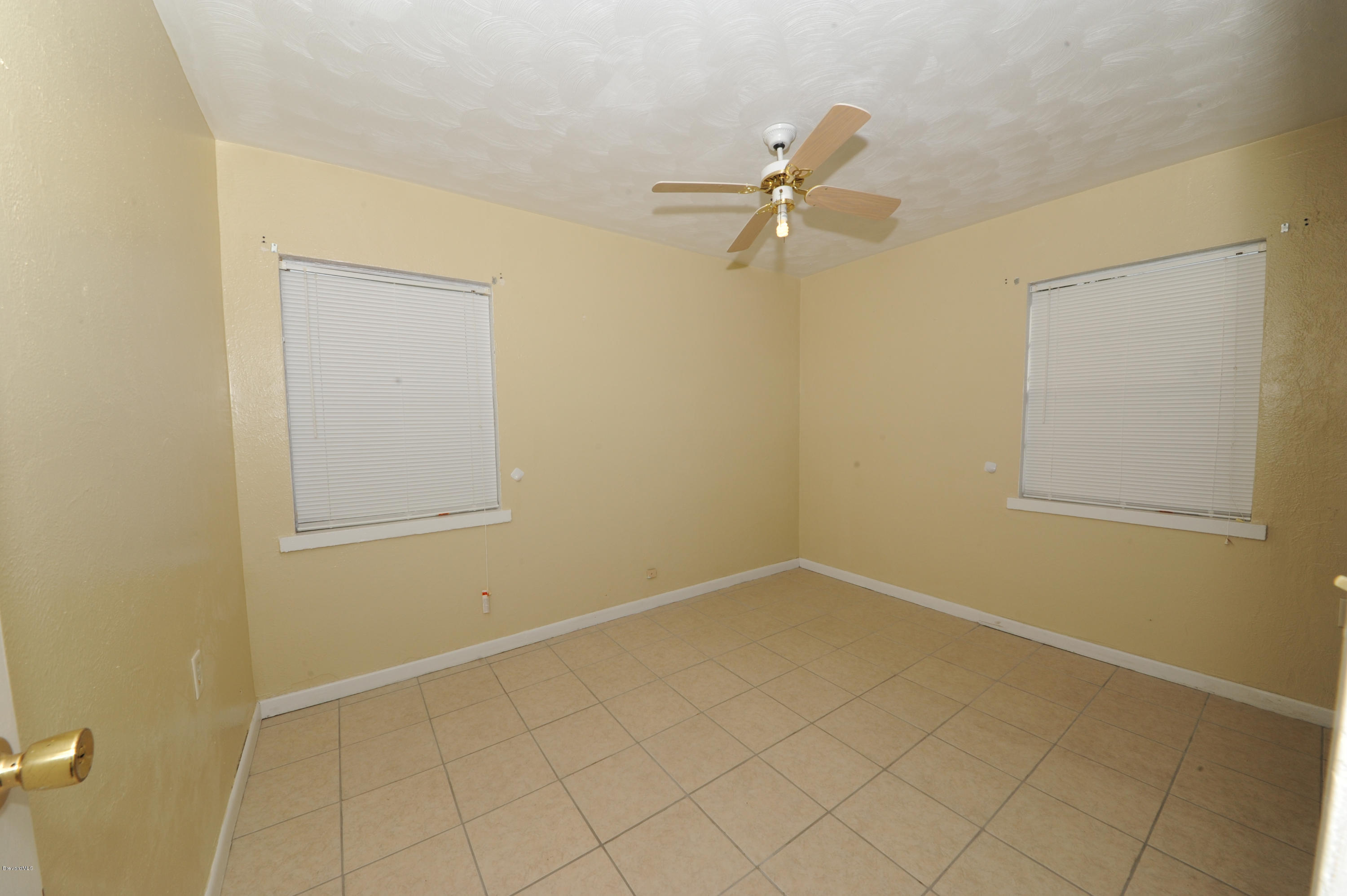 1014 Woodlawn Road Rockledge, FL 32955 - Photo 23 of 42 Bedroom 3 - View 1