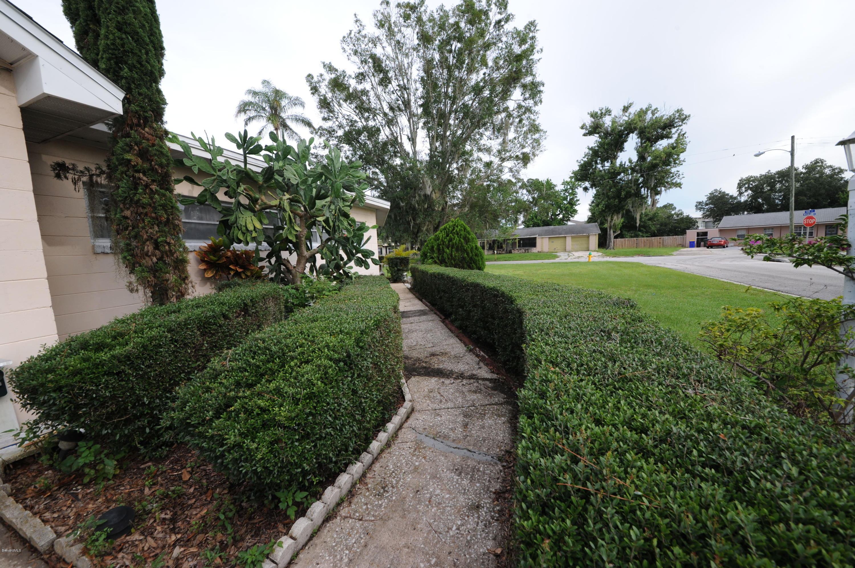 1014 Woodlawn Road Rockledge, FL 32955 - Photo 34 of 42 Walkway to Front Door