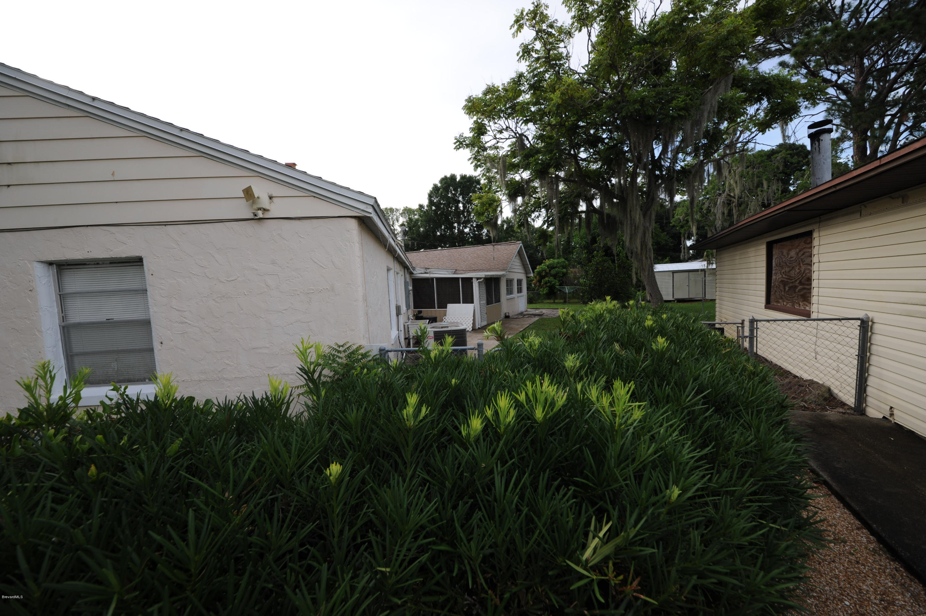 1014 Woodlawn Road Rockledge, FL 32955 - Photo 40 of 42 Side and Back