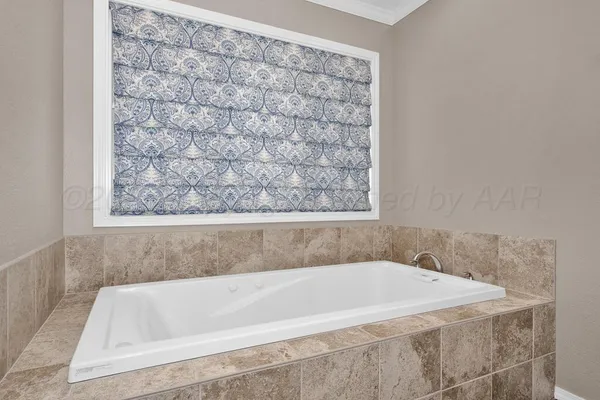 a bathroom with a bathtub