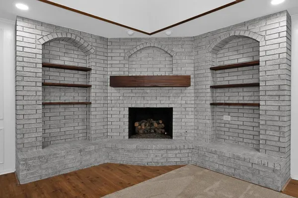 a living room with a fireplace