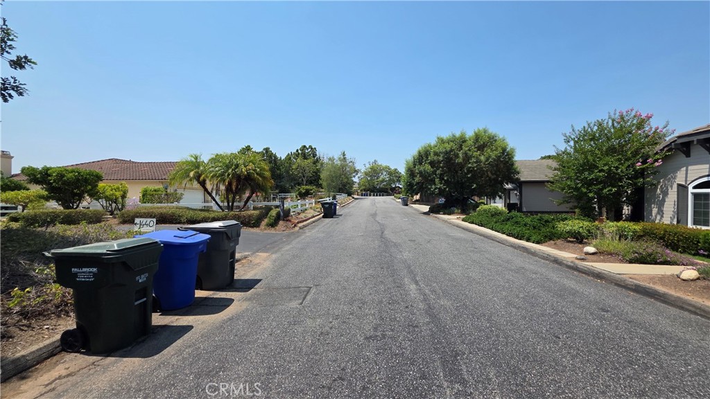 4140 Meredith Road Fallbrook, CA 92028 - Photo 9 of 12 a view of a patio with dining table and chairs with plants