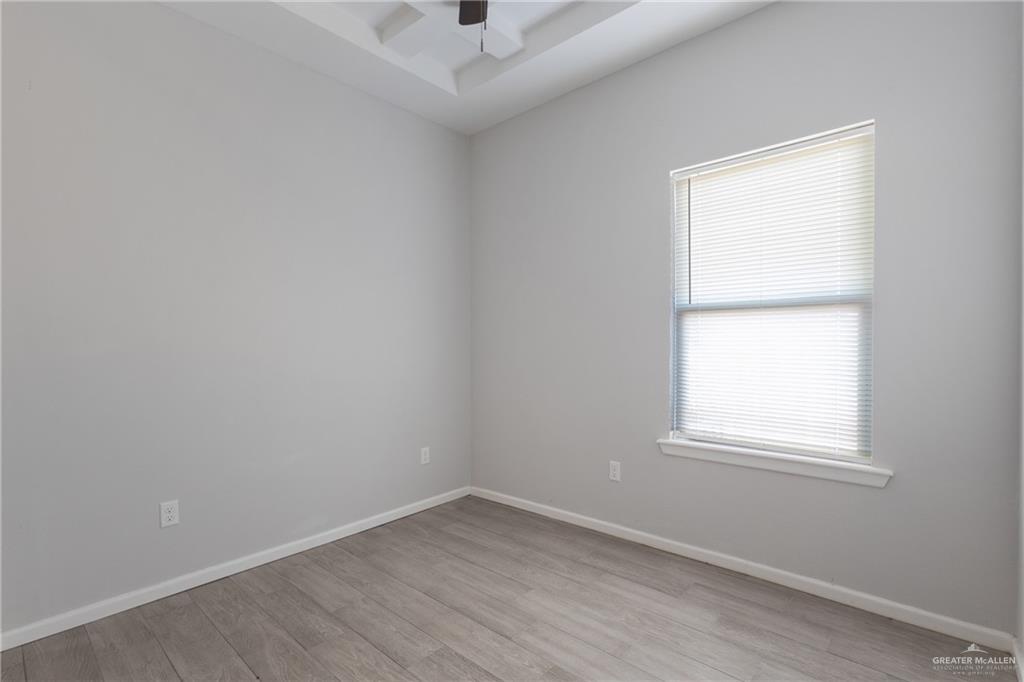 340 Eva Street Elsa, TX 78543 - Photo 7 of 12 an empty room with a window