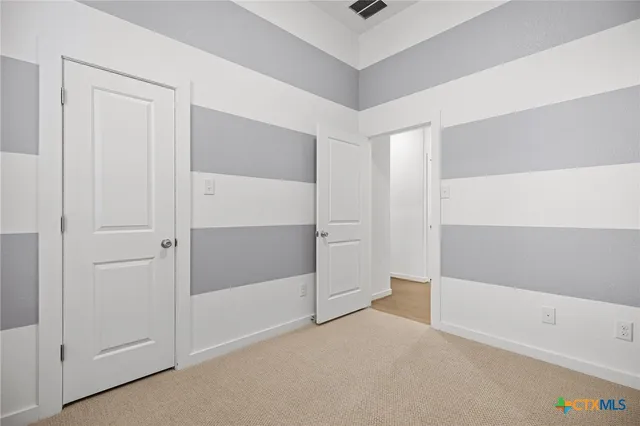 a view of a balcony dining area