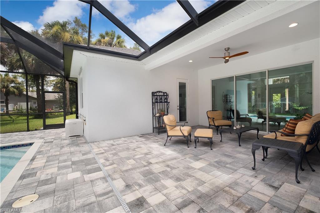 693 7th Street Northwest Naples, FL 34120 - Photo 26 of 32 a view of a entryway front of house
