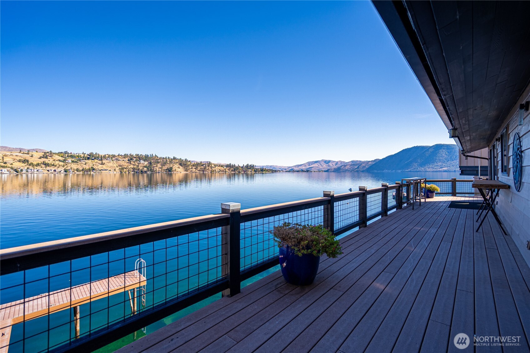 10370 South Lakeshore Road Chelan, WA 98816 - Photo 13 of 31 a view of deck with seating space and lake view
