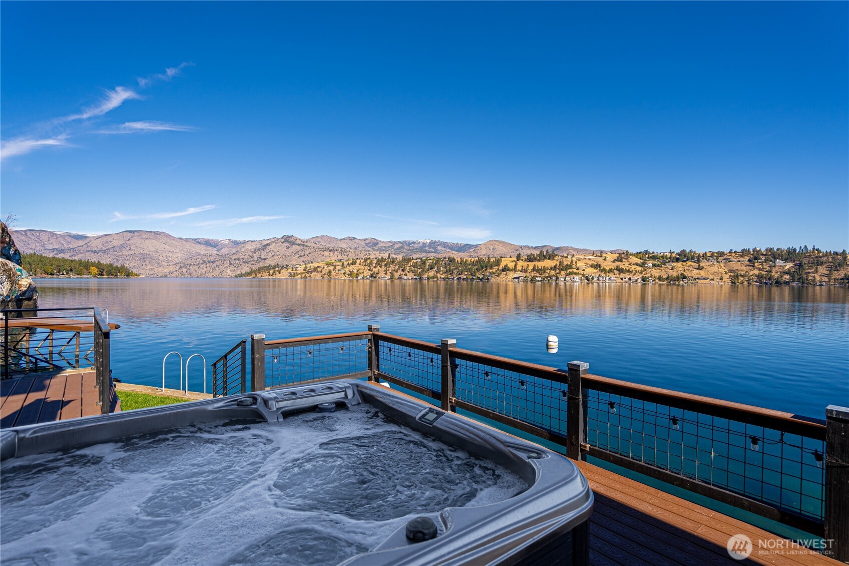 10370 South Lakeshore Road Chelan, WA 98816 - Photo 16 of 31 a view of a terrace with chairs
