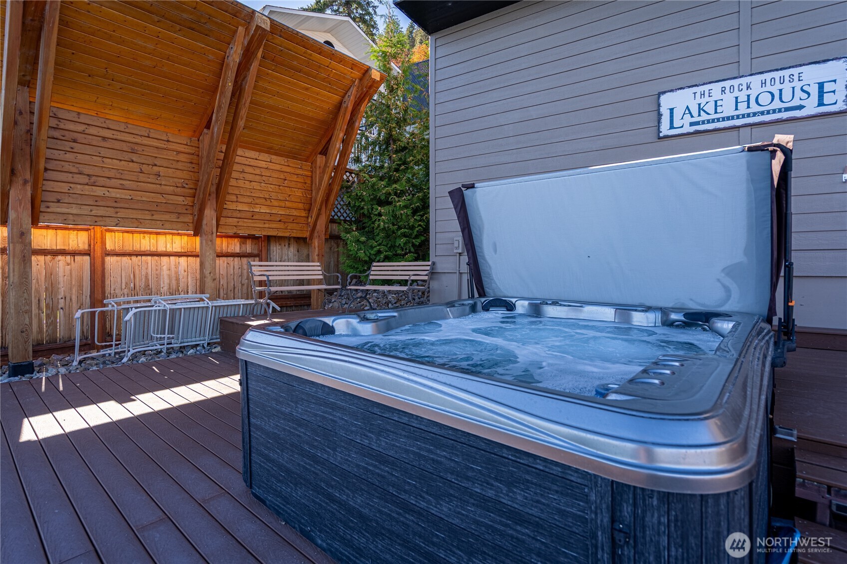 10370 South Lakeshore Road Chelan, WA 98816 - Photo 17 of 31 a view of a backyard with sitting area