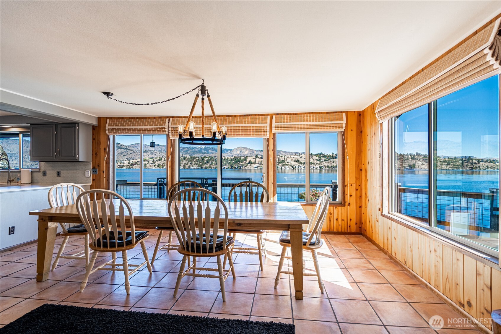 10370 South Lakeshore Road Chelan, WA 98816 - Photo 18 of 31 a view of a dining room with furniture window and outside view