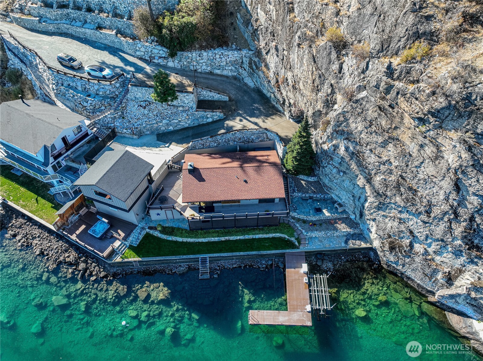 10370 South Lakeshore Road Chelan, WA 98816 - Photo 2 of 31 an aerial view of a house with a garden
