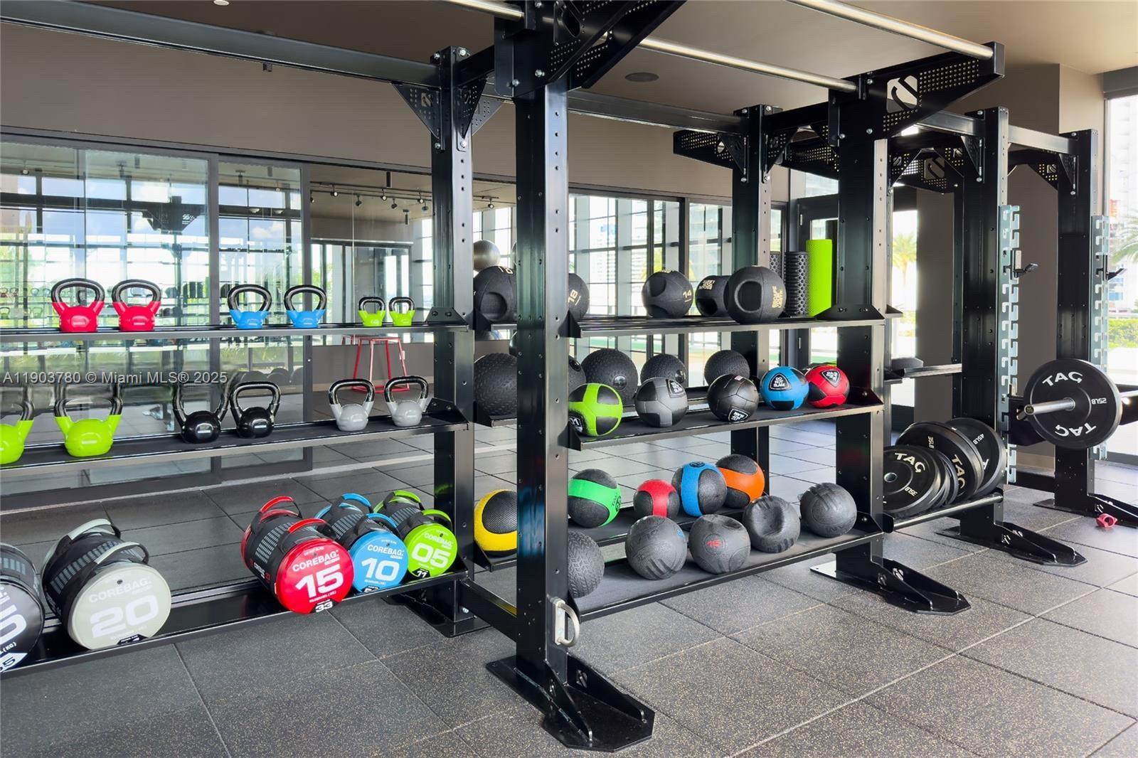 159 Northeast 6th Street, Unit PH5014 Miami, FL 33132 - Photo 36 of 41 a living room with lots of clutter and cars