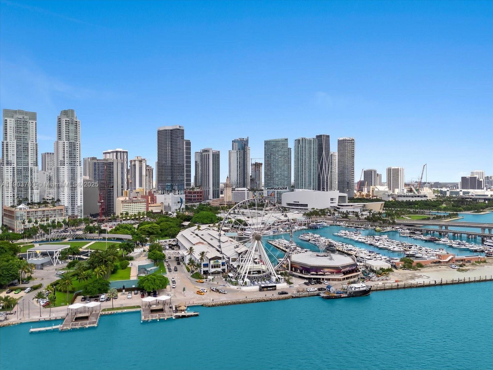 159 Northeast 6th Street, Unit PH5014 Miami, FL 33132 - Photo 37 of 41 a view of a city with tall buildings