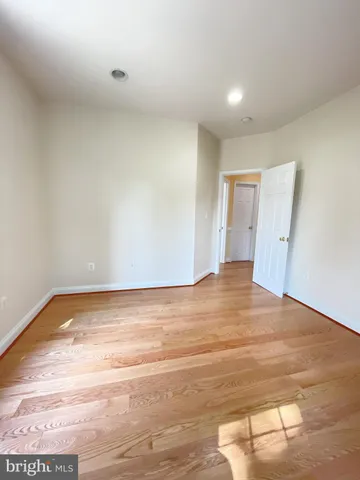 a kitchen with stainless steel appliances granite countertop wooden cabinets a granite counter top and a stove