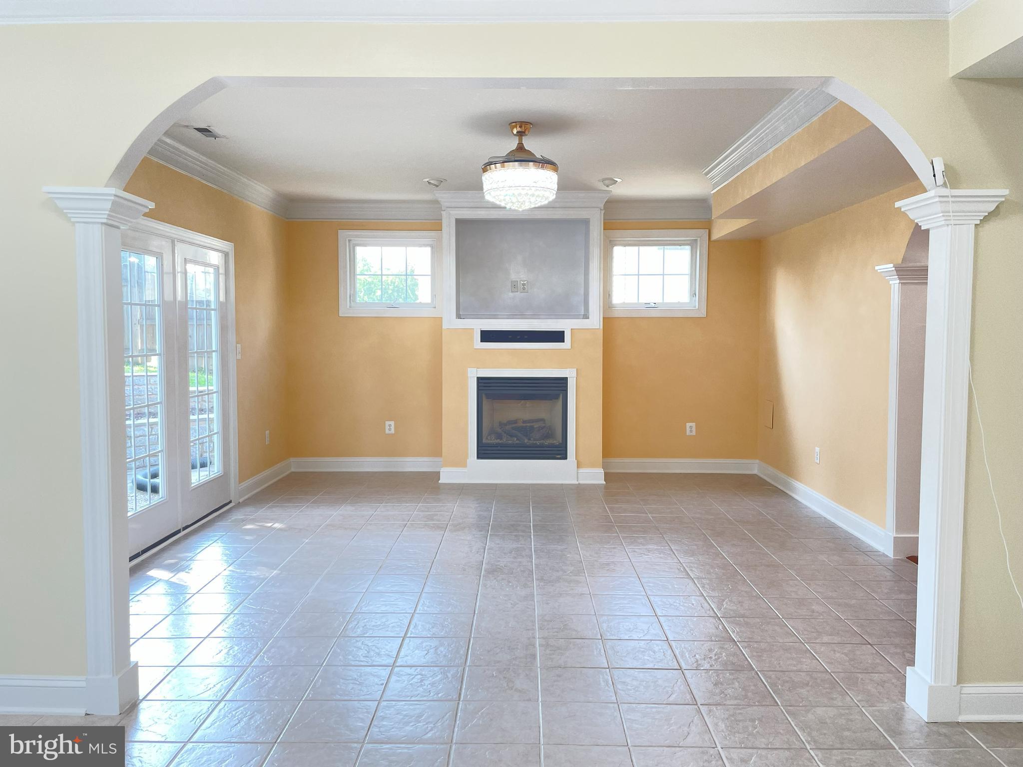 7212 Highland Street Springfield, VA 22150 - Photo 16 of 60 a view of an empty room with window and cabinet