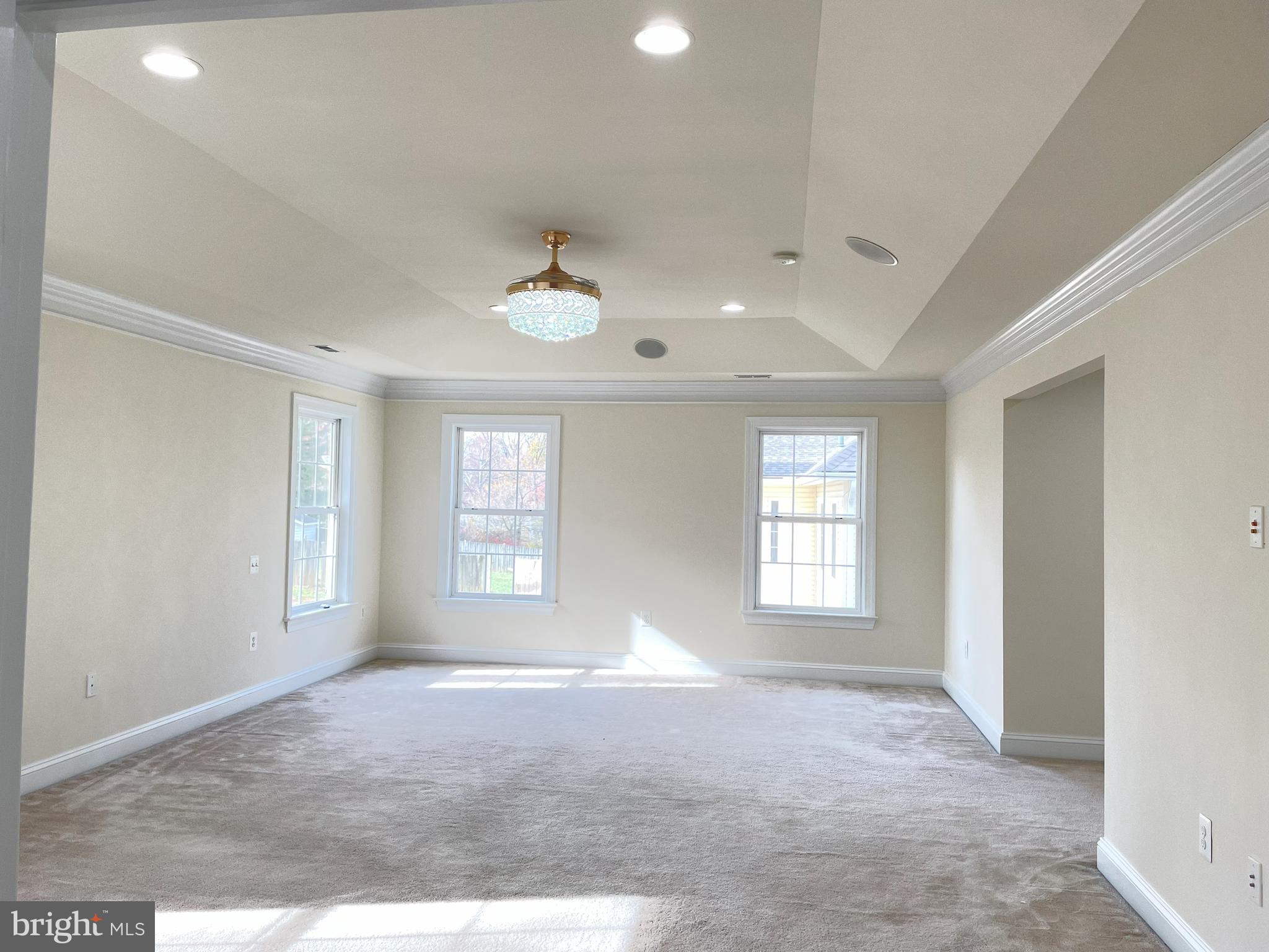 7212 Highland Street Springfield, VA 22150 - Photo 19 of 60 a view of an empty room with window and wooden floor