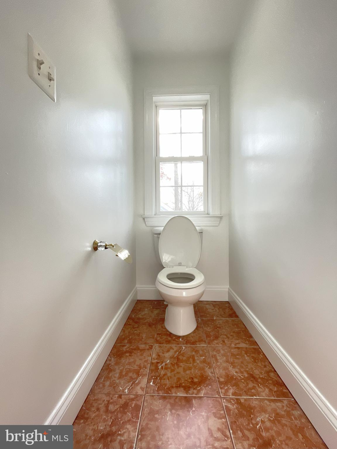 7212 Highland Street Springfield, VA 22150 - Photo 24 of 60 a bathroom with a toilet