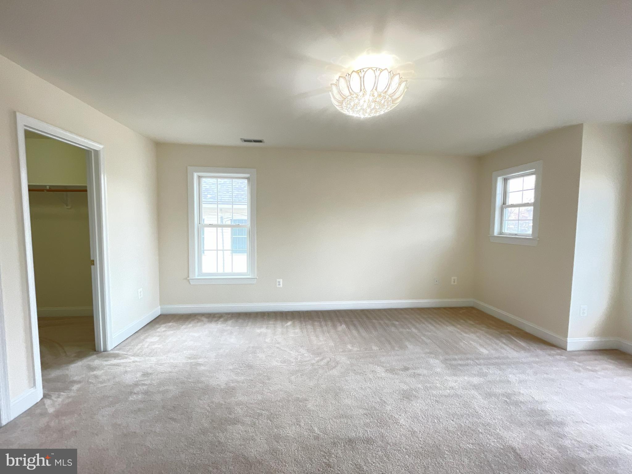 7212 Highland Street Springfield, VA 22150 - Photo 27 of 60 wooden floor and windows in an empty room