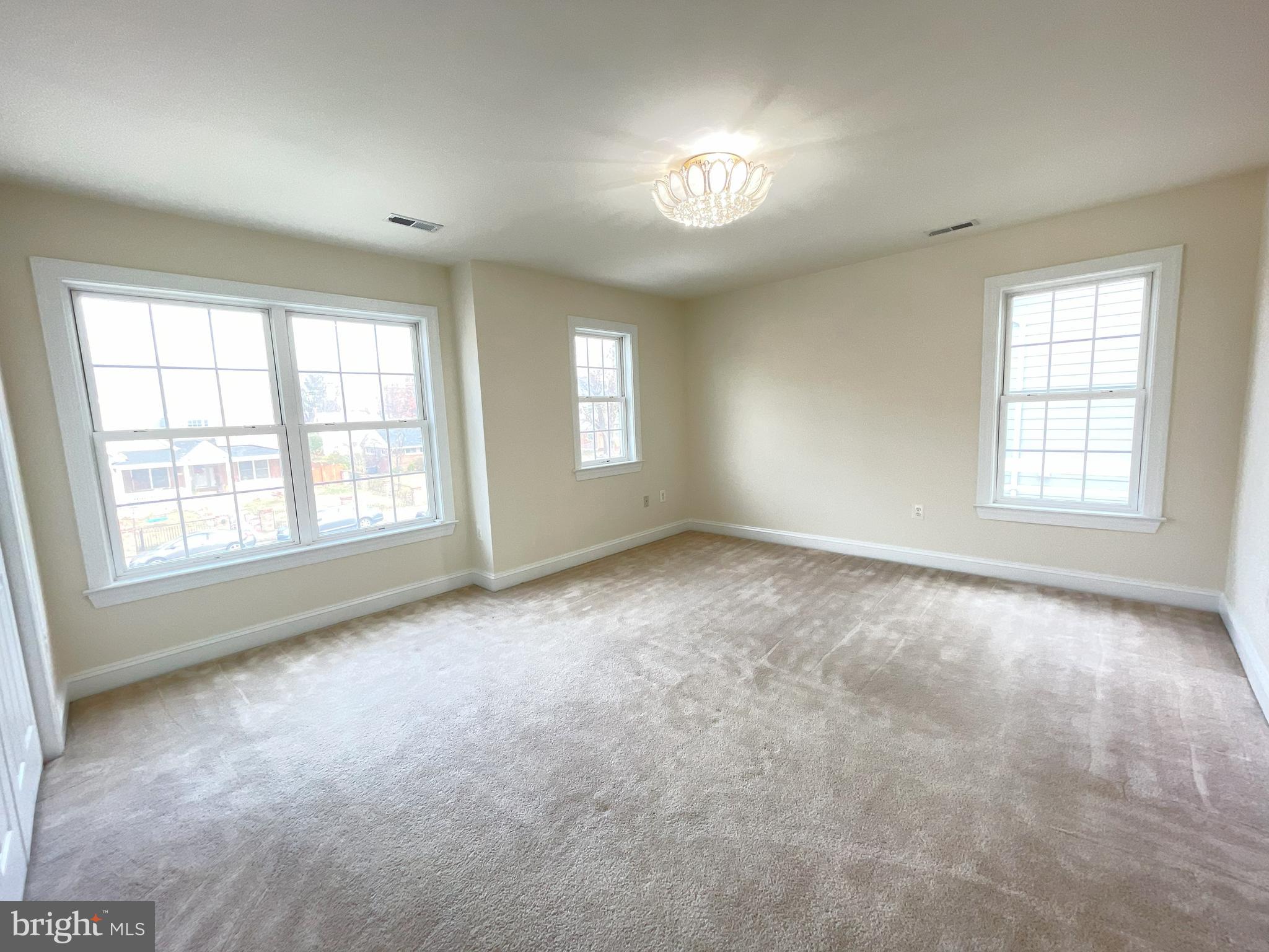 7212 Highland Street Springfield, VA 22150 - Photo 31 of 60 an empty room with windows