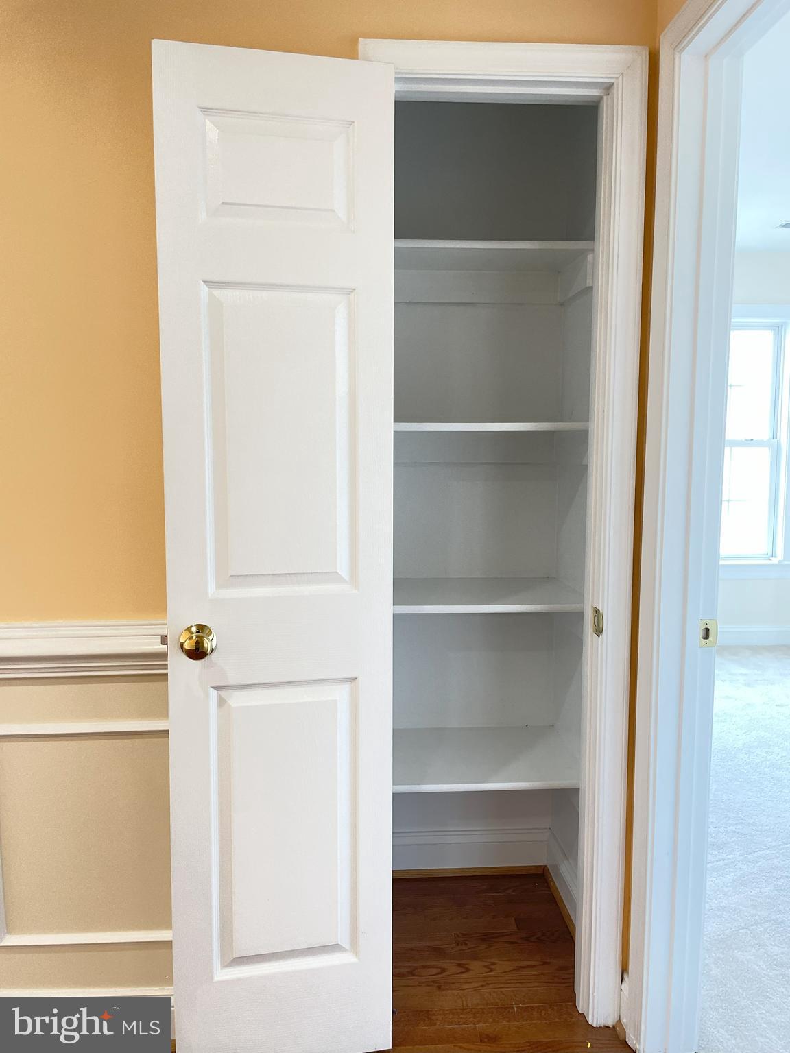 7212 Highland Street Springfield, VA 22150 - Photo 36 of 60 a view of walk in closet with empty racks