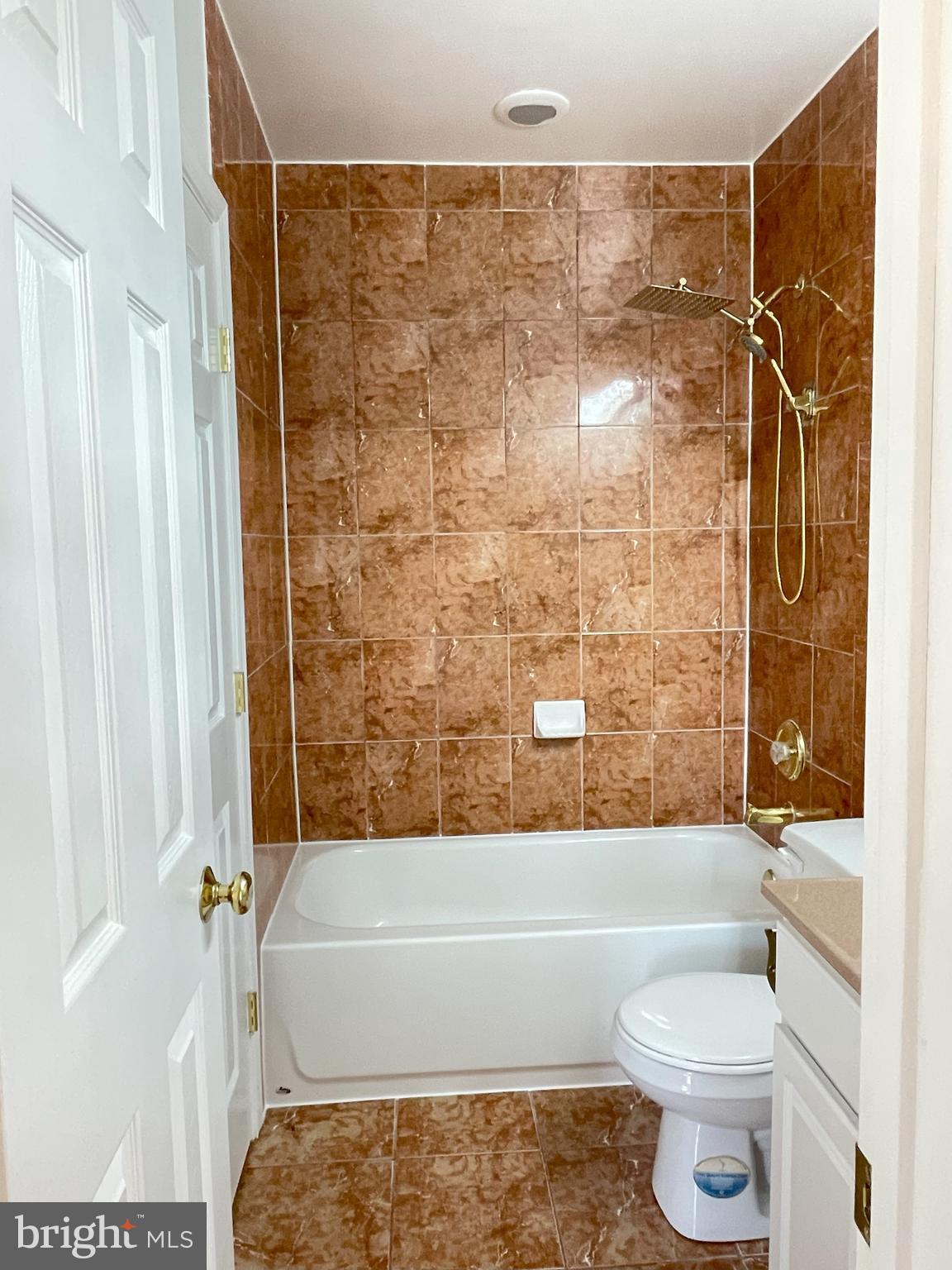 7212 Highland Street Springfield, VA 22150 - Photo 42 of 60 a bathroom with a toilet and a shower