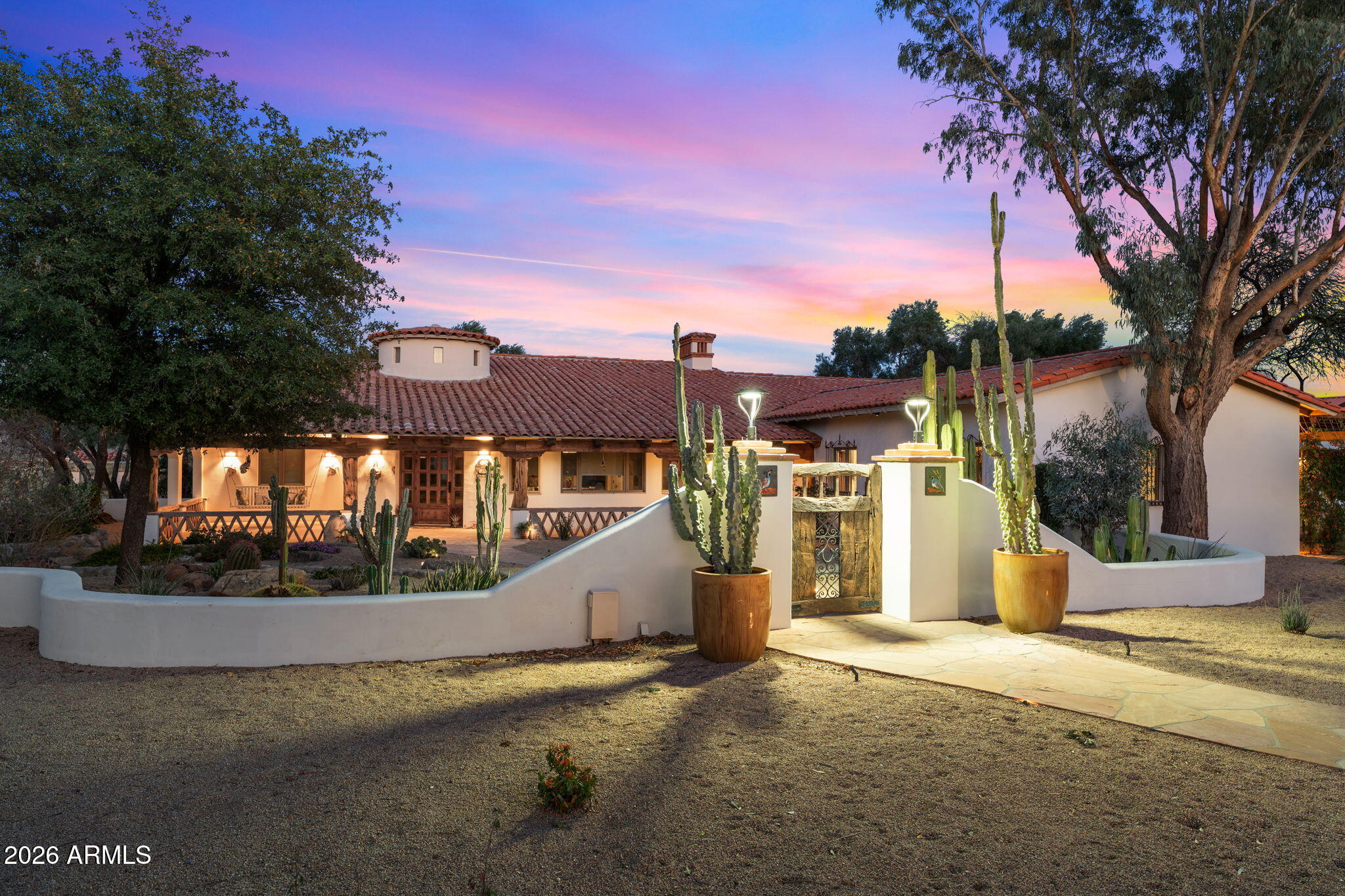 a view of a house with basketball court