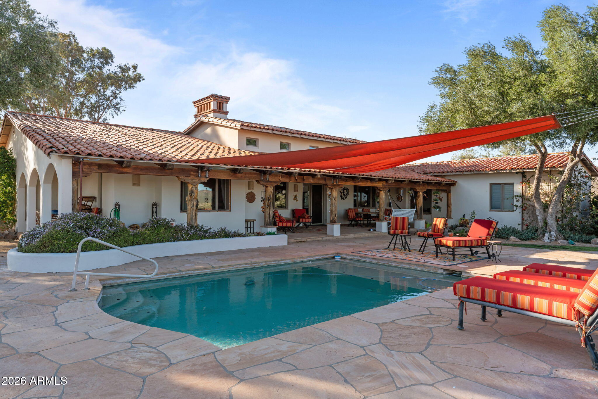 18210 Moonlight Mesa Road Wickenburg, AZ 85390 - Photo 111 of 141 a view of a chairs and table in the patio
