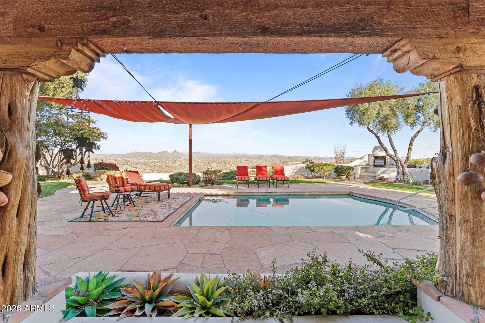 18210 Moonlight Mesa Road Wickenburg, AZ 85390 - Photo 119 of 141 a view of swimming pool with outdoor seating