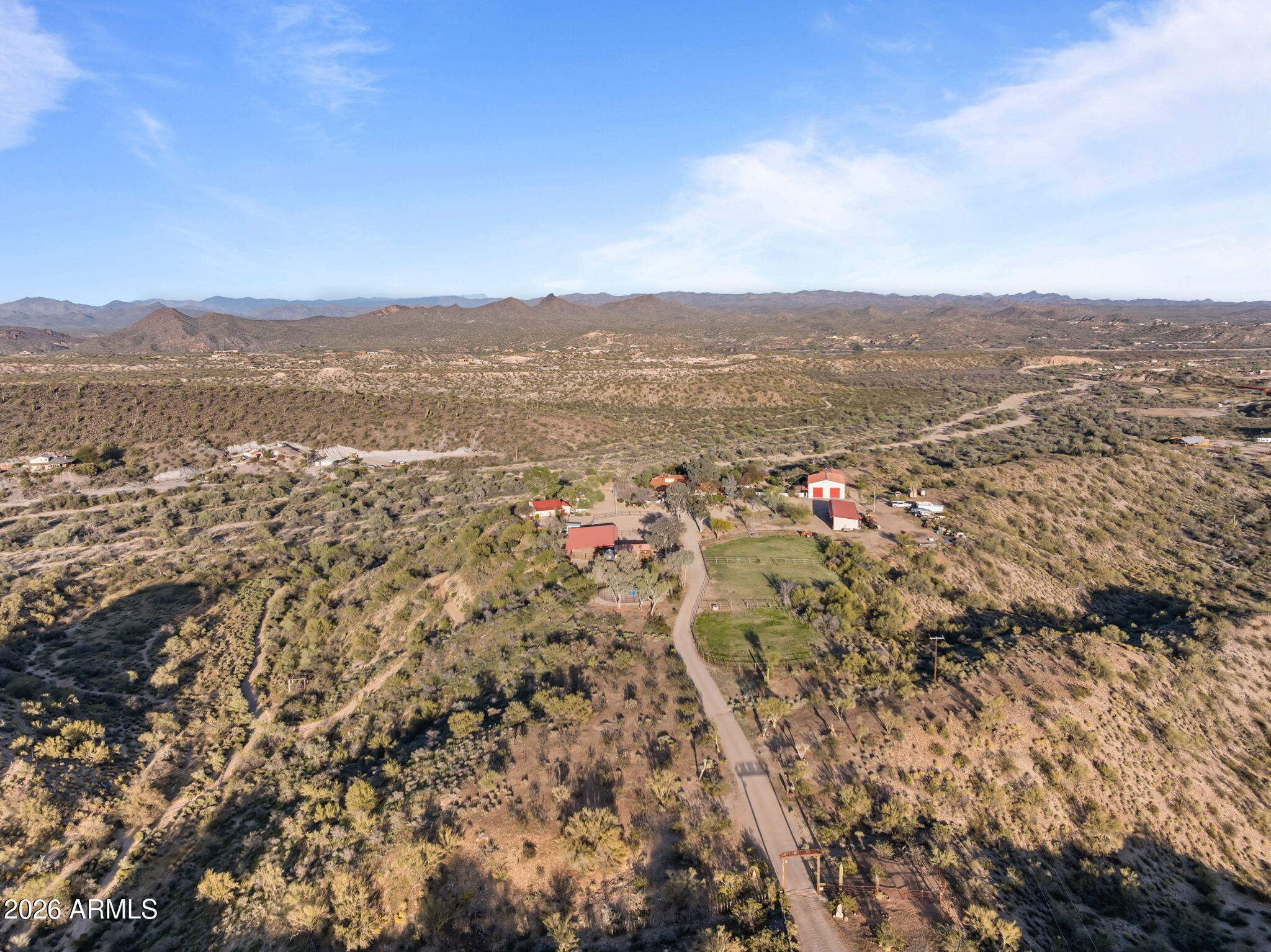 18210 Moonlight Mesa Road Wickenburg, AZ 85390 - Photo 133 of 141 an aerial view of residential houses with outdoor space and trees