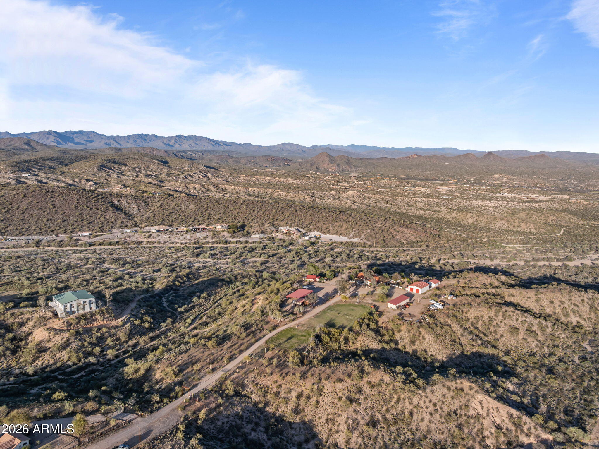 18210 Moonlight Mesa Road Wickenburg, AZ 85390 - Photo 134 of 141 a view of a city with mountains in the background