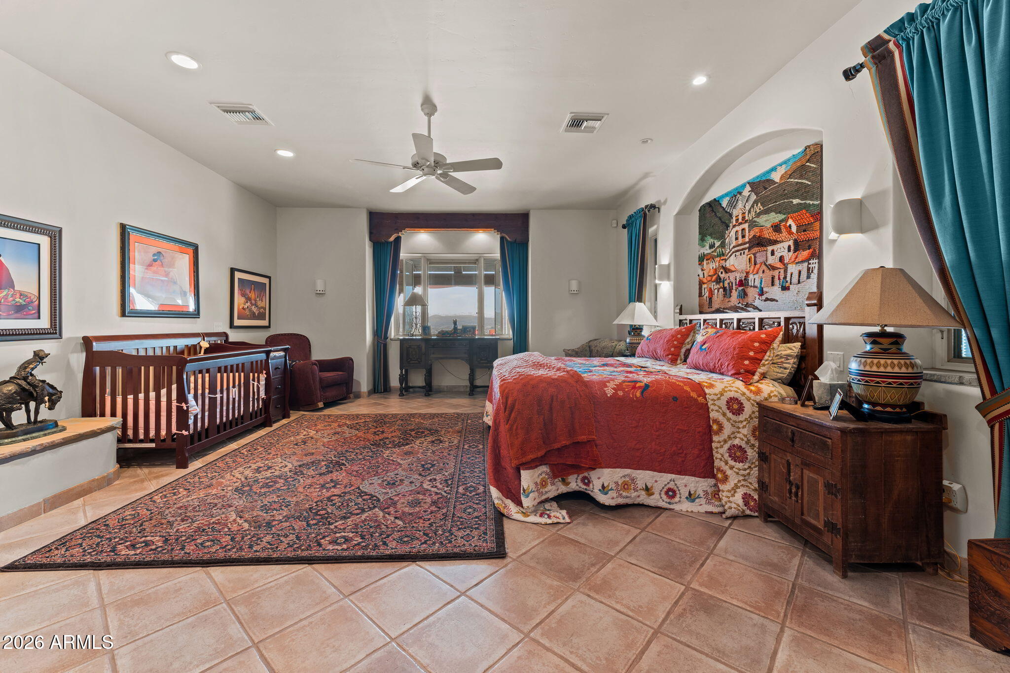 18210 Moonlight Mesa Road Wickenburg, AZ 85390 - Photo 23 of 141 a bed room with furniture and a flat screen tv