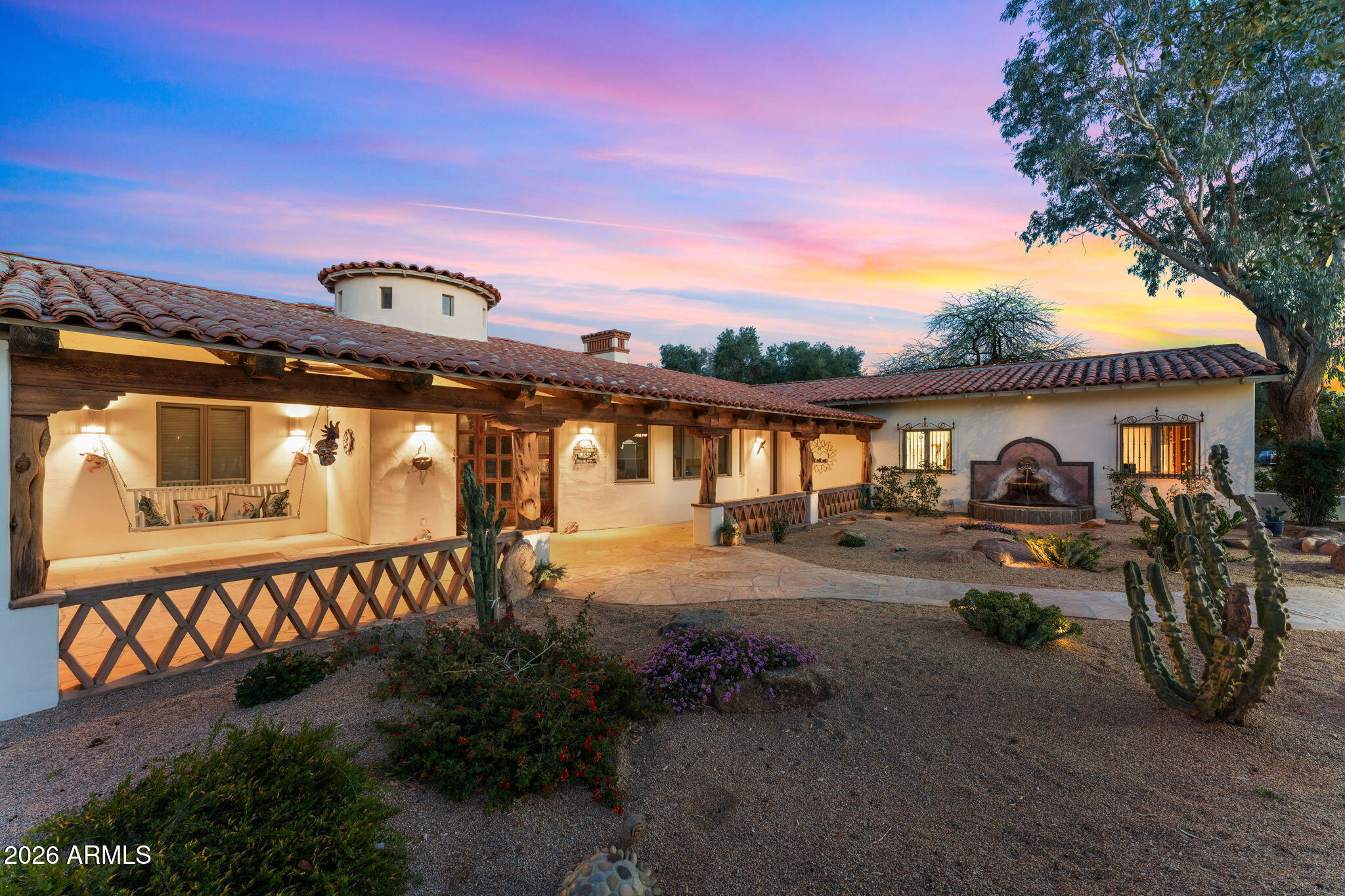 18210 Moonlight Mesa Road Wickenburg, AZ 85390 - Photo 4 of 141 a front view of a house with garden