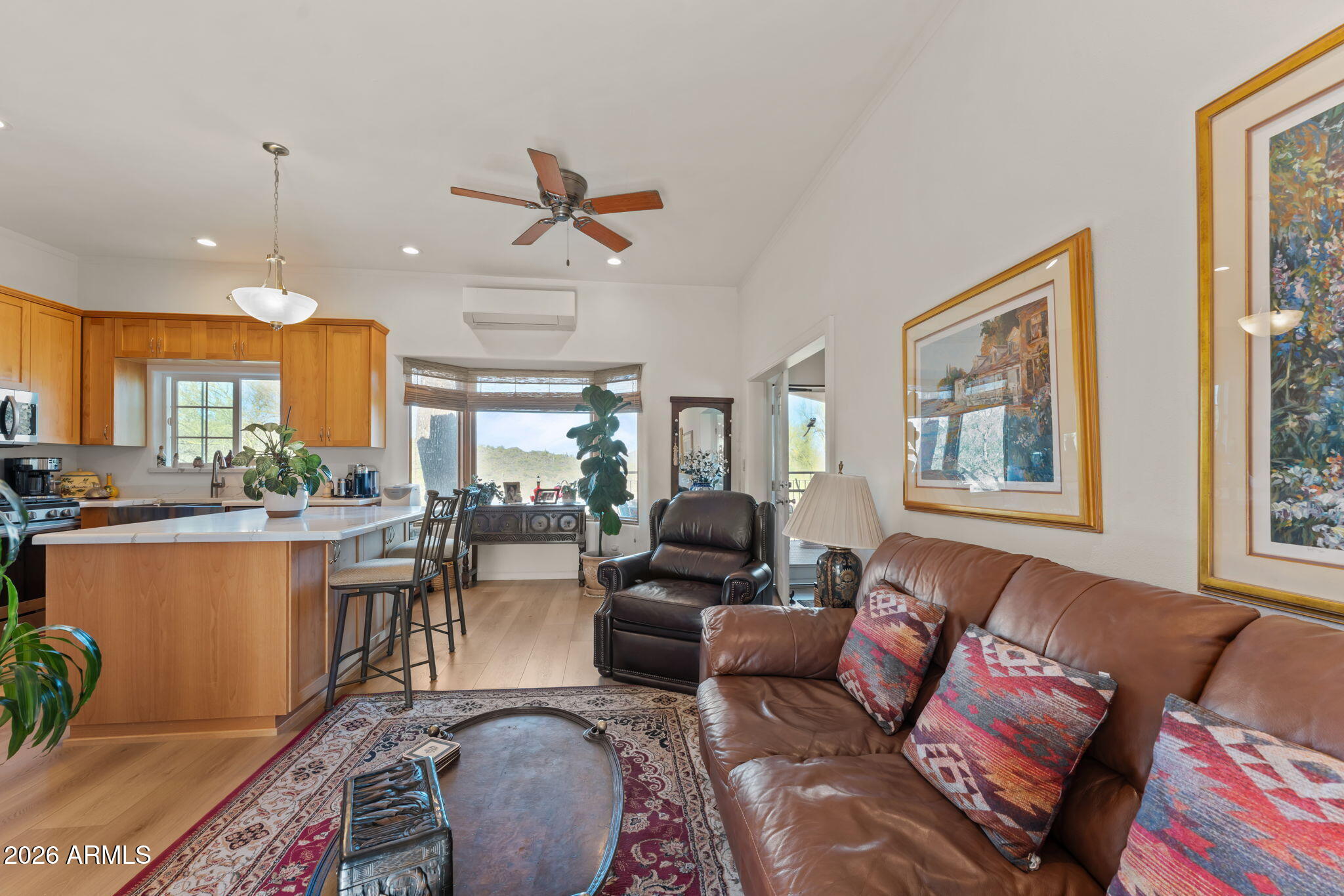 18210 Moonlight Mesa Road Wickenburg, AZ 85390 - Photo 66 of 141 a living room with furniture and a large window