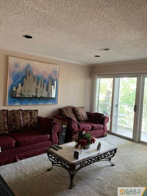 125 Edpas Road, Unit 125 New Brunswick, NJ 08901 - Photo 1 of 9 a living room with furniture and a air conditioner vent