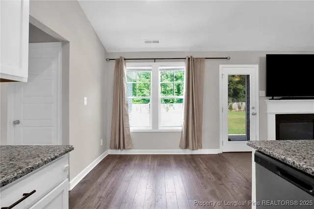 a view of livingroom with kitchen