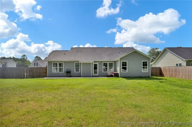 a front view of house with garden