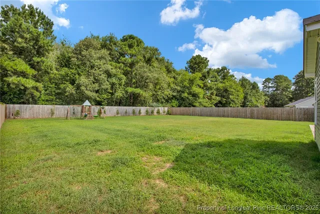 a house view with a garden space