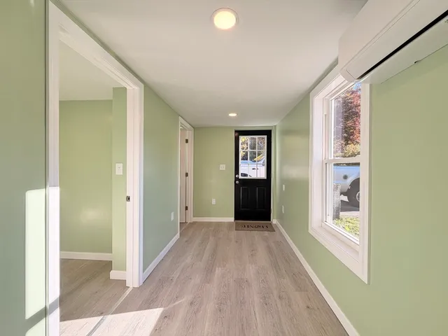 a view of empty room with front door