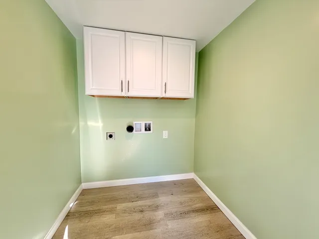 a view of room with cabinets