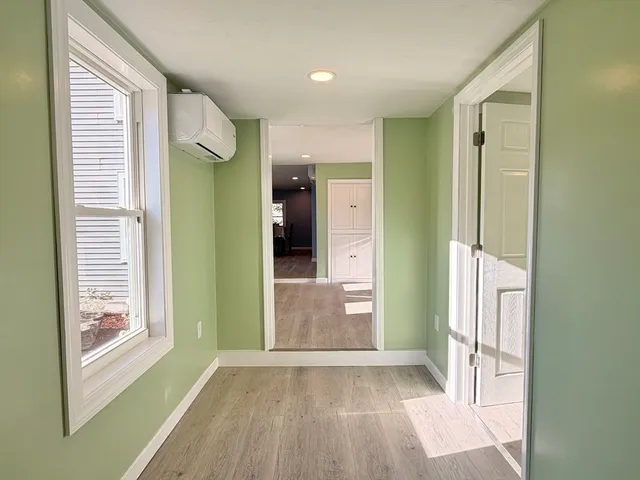 a view of an empty room and window