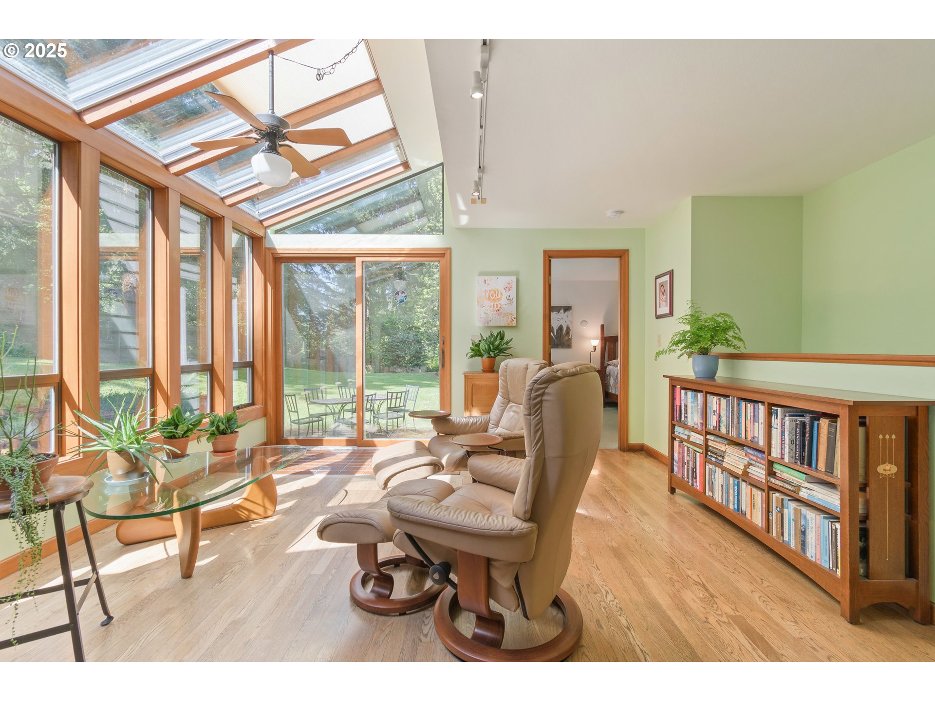888 Crest Drive Eugene, OR 97405 - Photo 19 of 48 a living room with furniture and a large window