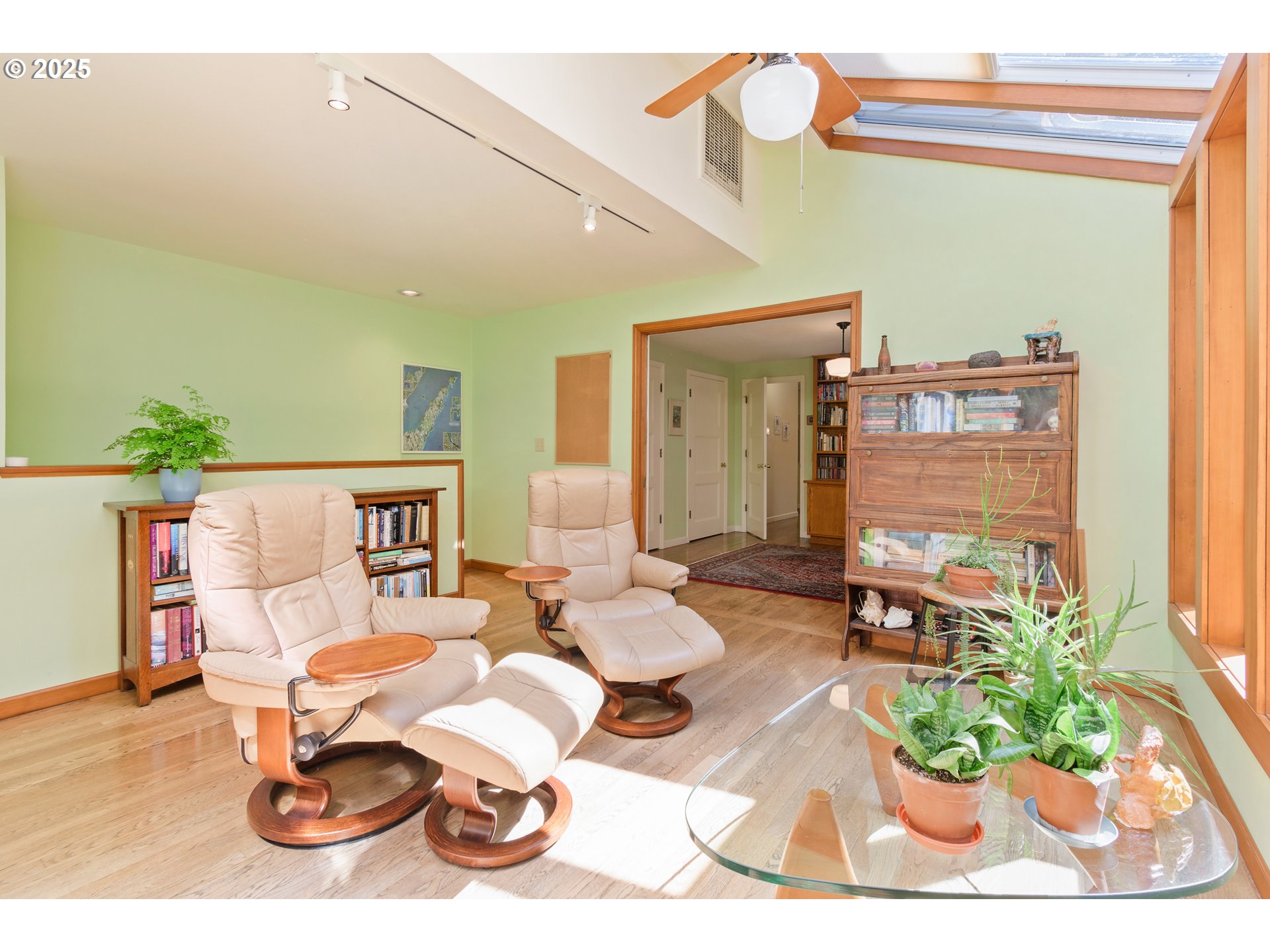 888 Crest Drive Eugene, OR 97405 - Photo 20 of 48 a dining room with furniture and a potted plant