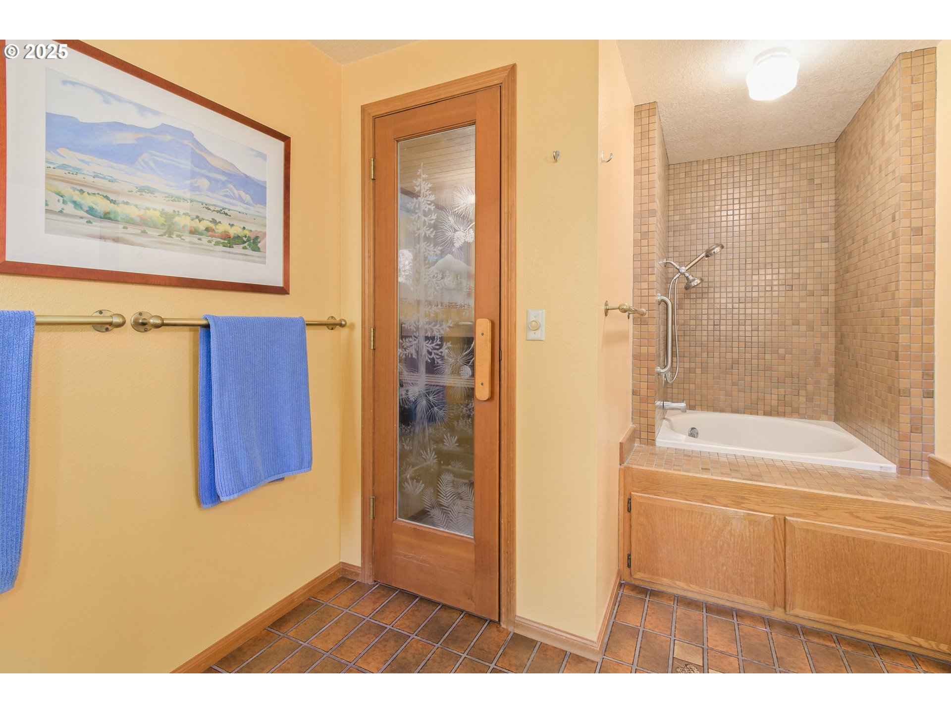 888 Crest Drive Eugene, OR 97405 - Photo 25 of 48 a bathroom with a shower and a bath tub