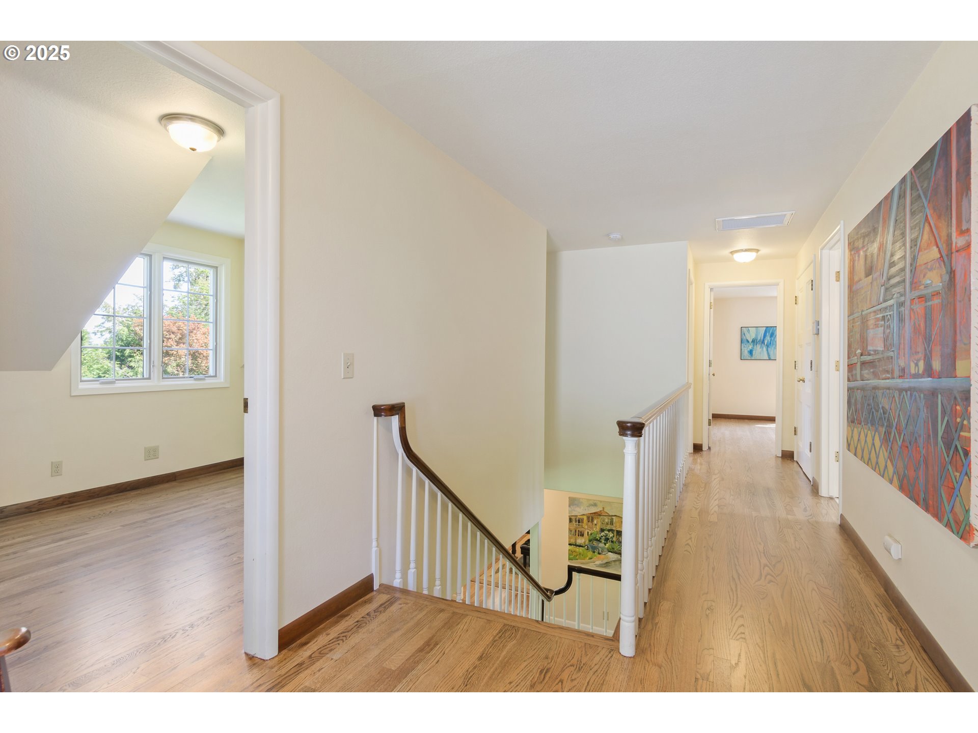 888 Crest Drive Eugene, OR 97405 - Photo 28 of 48 a view of an entryway with wooden floor