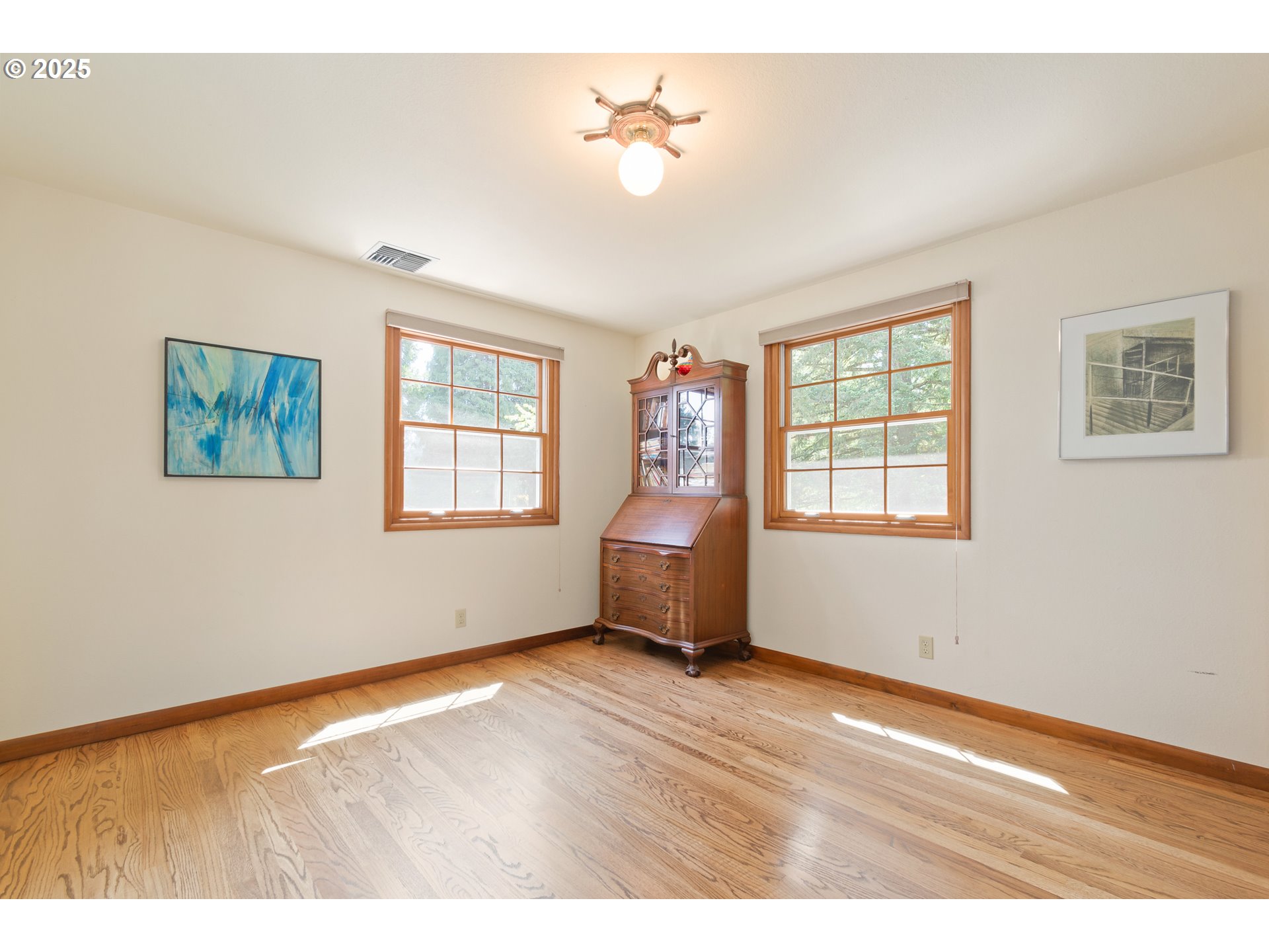 888 Crest Drive Eugene, OR 97405 - Photo 34 of 48 a view of an empty room with a window