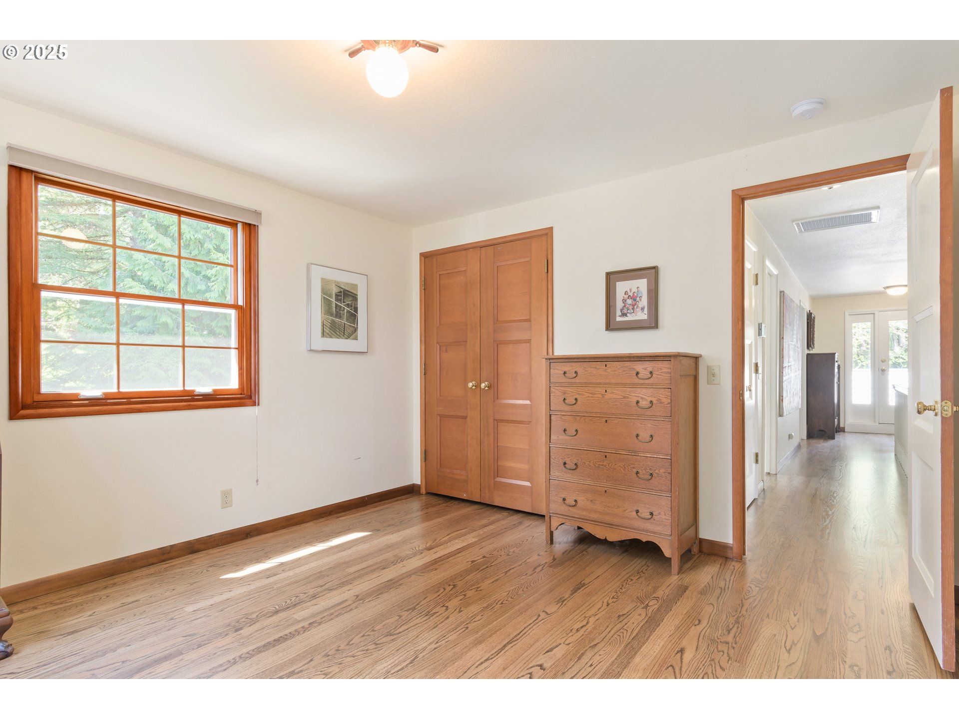 888 Crest Drive Eugene, OR 97405 - Photo 35 of 48 wooden floor in an empty room with a window