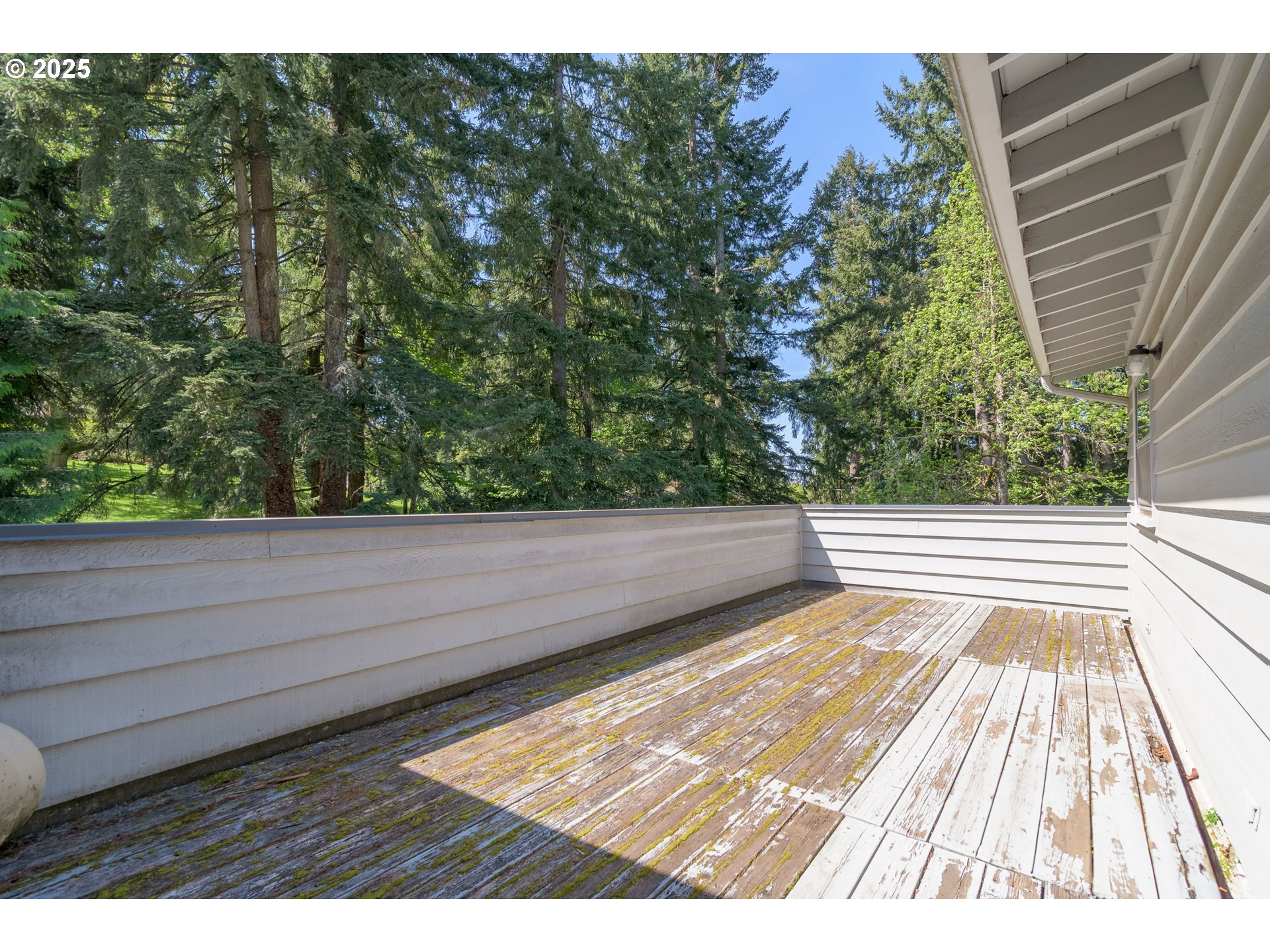 888 Crest Drive Eugene, OR 97405 - Photo 38 of 48 a view of balcony with wooden floor and fence