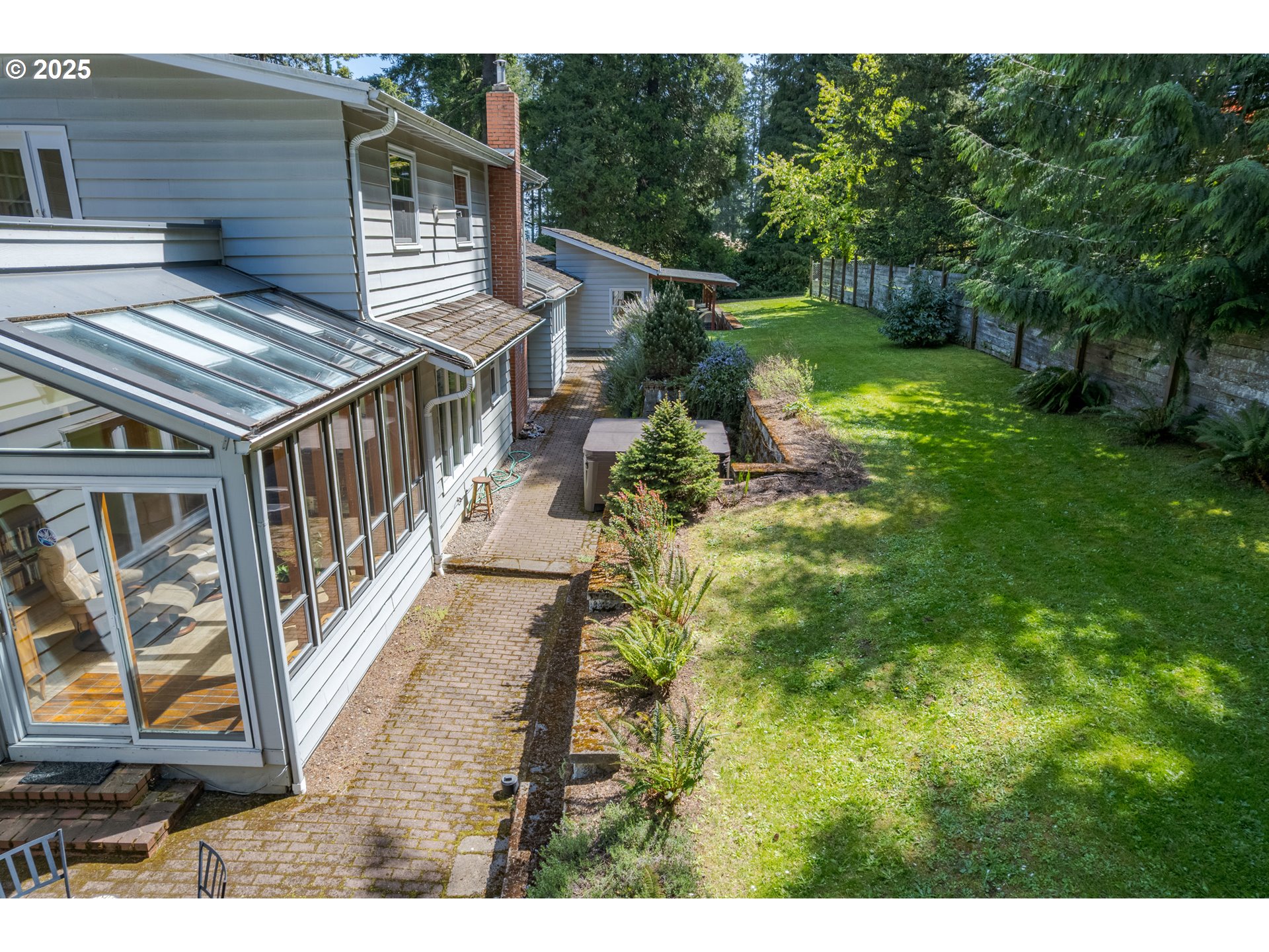 888 Crest Drive Eugene, OR 97405 - Photo 40 of 48 a view of an house with backyard space and balcony