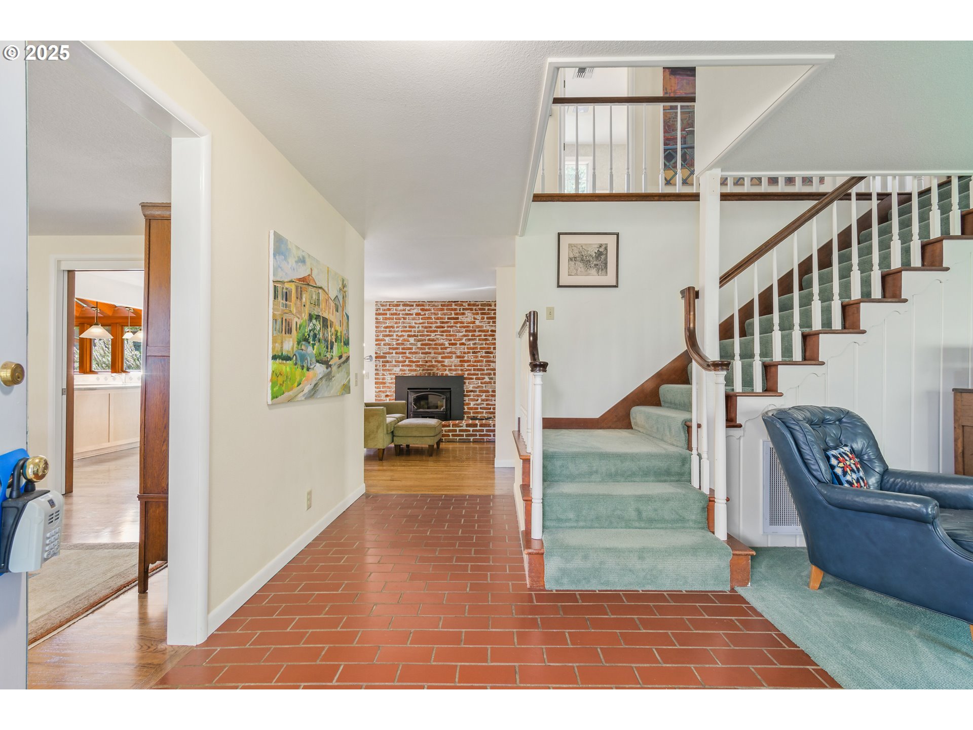 888 Crest Drive Eugene, OR 97405 - Photo 4 of 48 a view of entryway and hall with wooden floor